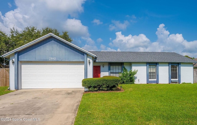 single story home with a front lawn and a garage