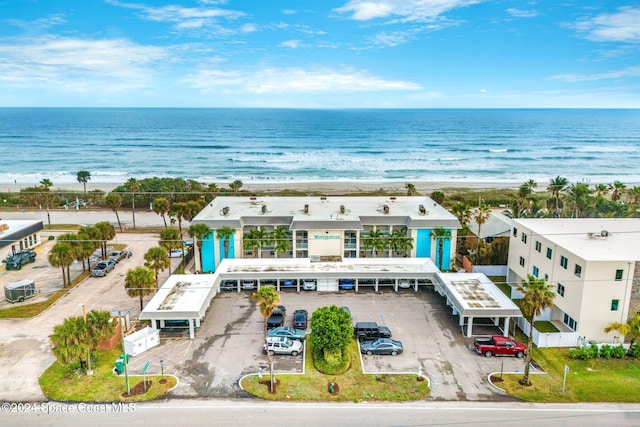 aerial view featuring a beach view and a water view