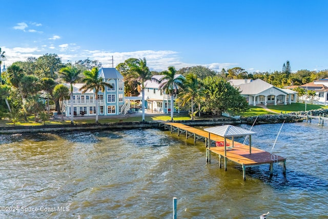 dock area featuring a water view