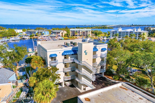 birds eye view of property featuring a water view