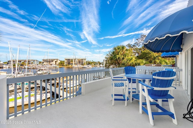 view of patio / terrace featuring a water view