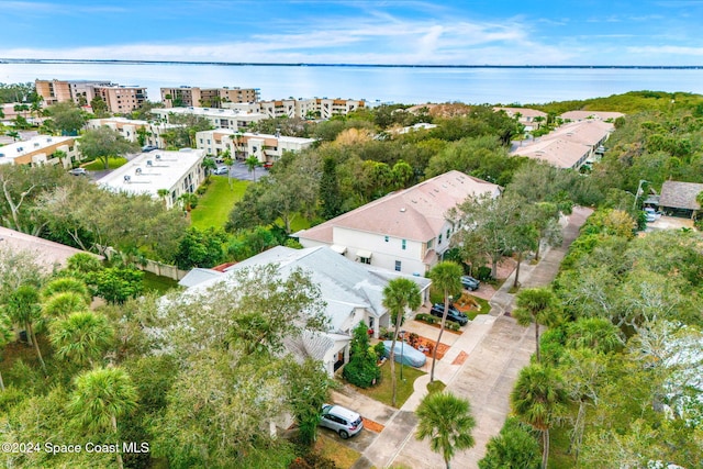 birds eye view of property featuring a water view