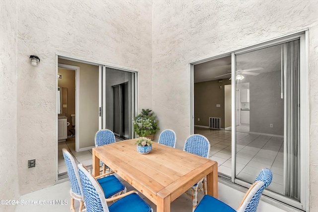 interior space featuring ceiling fan