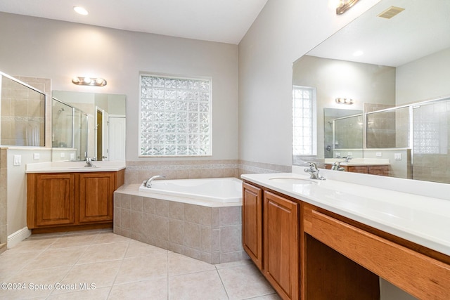 bathroom featuring vanity, tile patterned floors, and independent shower and bath