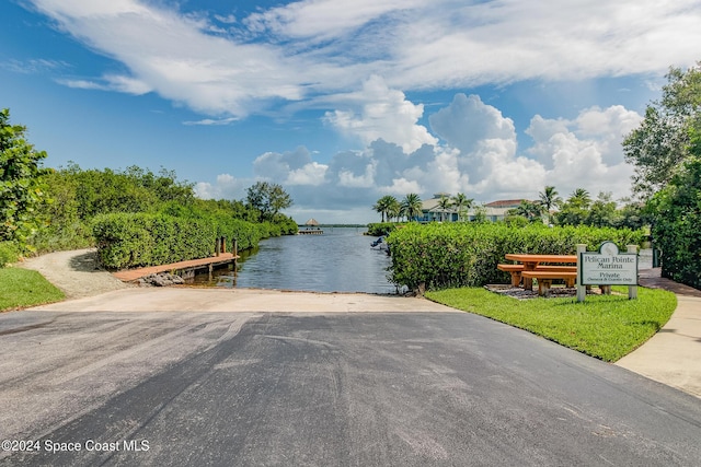 property view of water featuring a boat dock