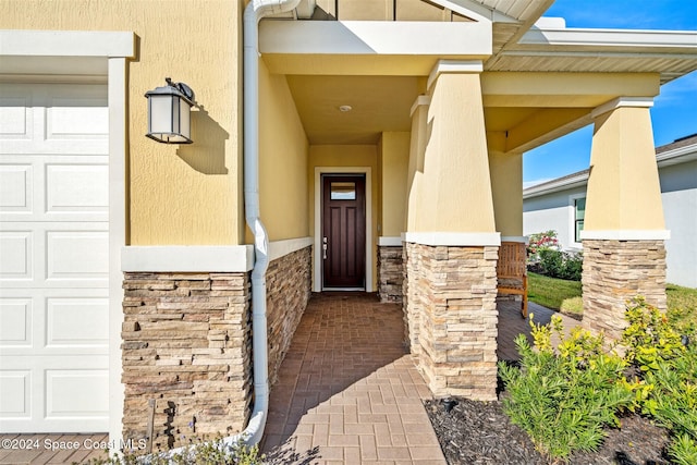 entrance to property with a garage