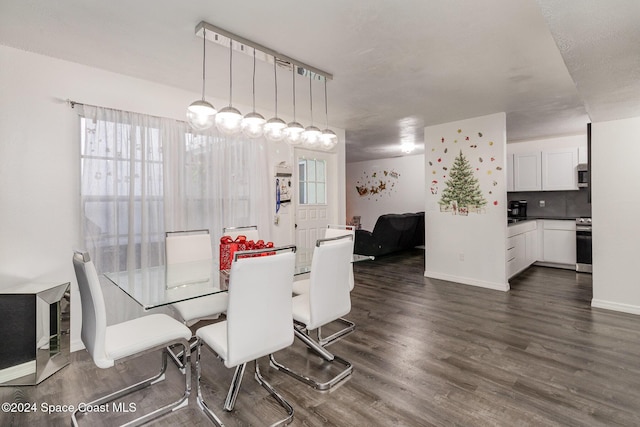 dining room with dark wood-type flooring