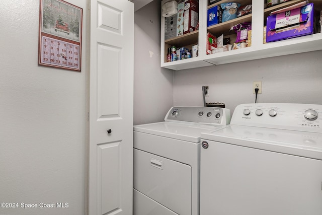 laundry room with washer and dryer