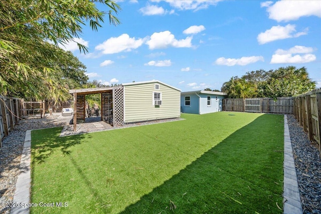 rear view of house featuring a yard