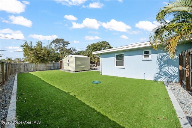 view of yard with a storage unit