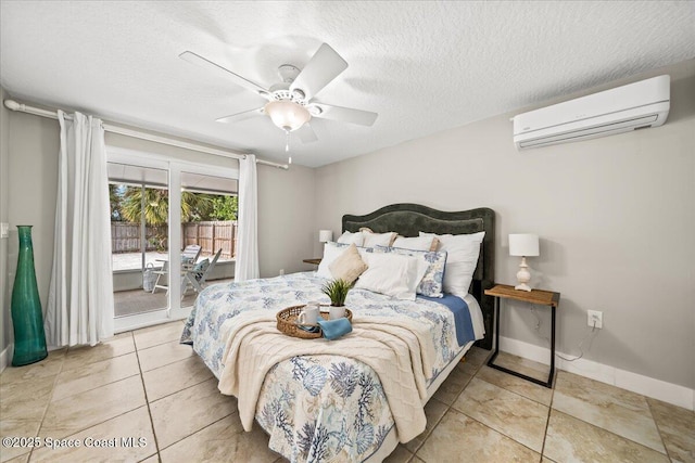 tiled bedroom featuring access to exterior, a textured ceiling, a wall unit AC, and ceiling fan