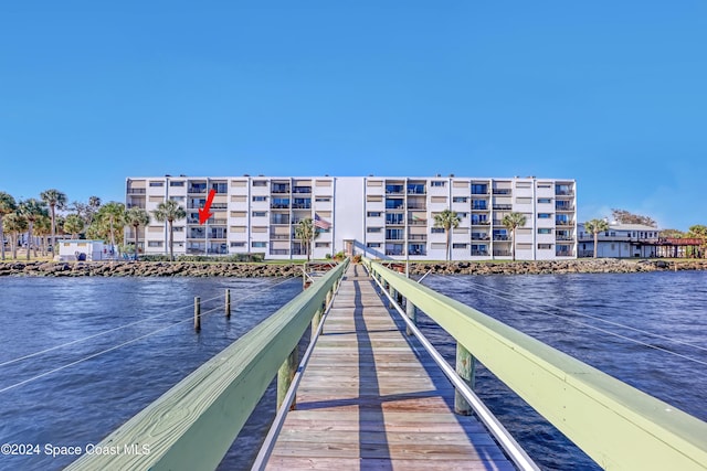 dock area with a water view