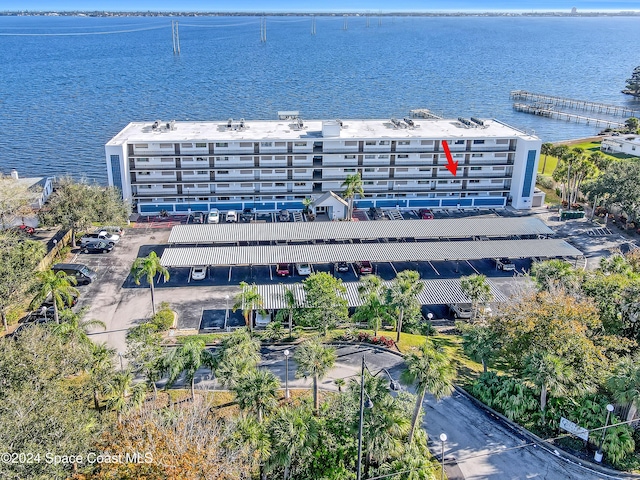 birds eye view of property featuring a water view