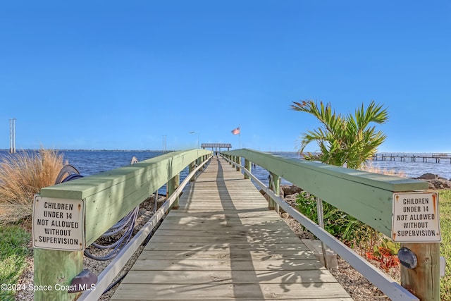 dock area featuring a water view