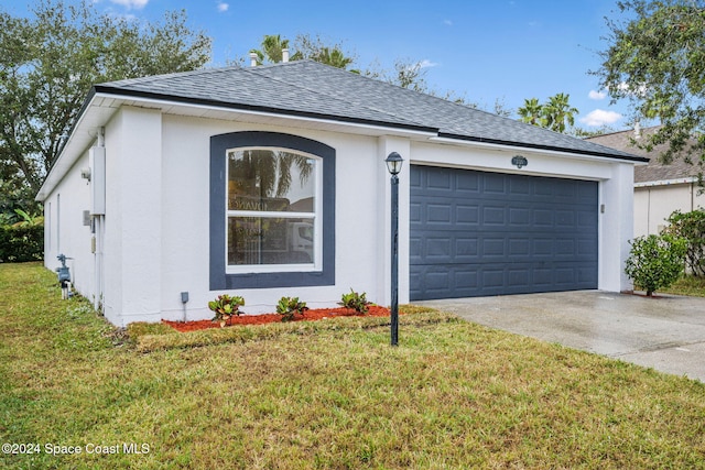 ranch-style home with a front lawn