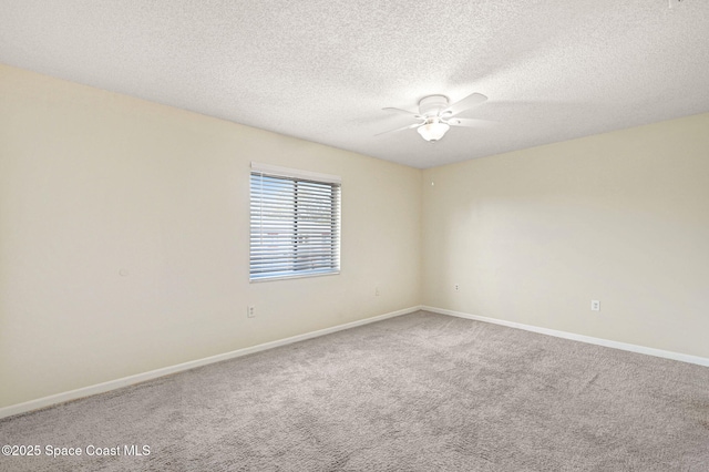 unfurnished room featuring carpet flooring, a textured ceiling, and ceiling fan