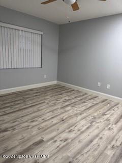 spare room featuring light hardwood / wood-style flooring