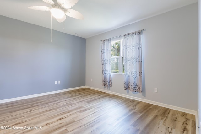 2342 Planter Ridge Ct, Palm Bay, FL 32909 - spare room with wood finished floors and ceiling fan