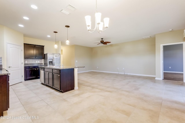 2342 Planter Ridge Ct, Palm Bay, FL 32909 - kitchen featuring stainless steel fridge with ice dispenser, ceiling fan, tasteful backsplash, a chandelier, and pendant lighting