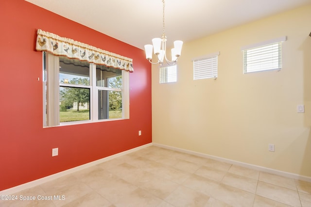 2342 Planter Ridge Ct, Palm Bay, FL 32909 - spare room featuring healthy amount of natural light and a chandelier
