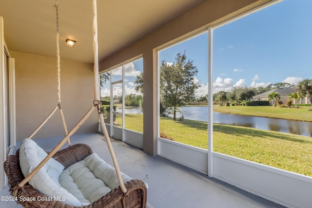 2342 Planter Ridge Ct, Palm Bay, FL 32909 - sunroom / solarium featuring a water view