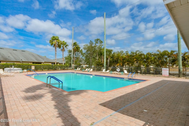 2342 Planter Ridge Ct, Palm Bay, FL 32909 - community pool featuring a patio area