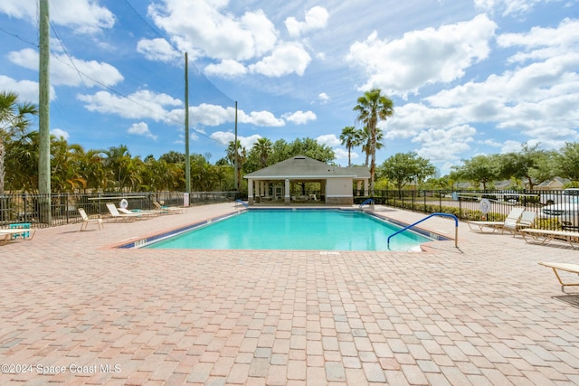 2342 Planter Ridge Ct, Palm Bay, FL 32909 - community pool featuring a patio area