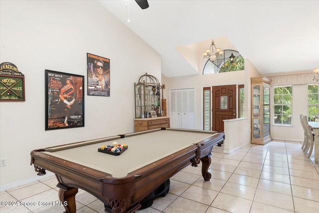 rec room featuring light tile patterned floors, ceiling fan with notable chandelier, high vaulted ceiling, and pool table