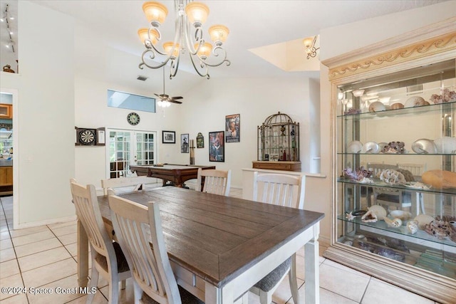 tiled dining space featuring french doors, ceiling fan, lofted ceiling, and pool table