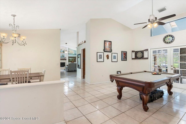 playroom featuring ceiling fan with notable chandelier, light tile patterned floors, pool table, and french doors