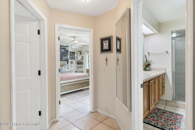 hallway with light tile patterned floors