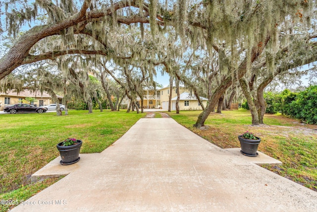 surrounding community featuring a lawn