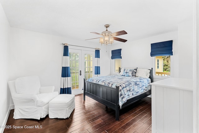 bedroom with access to outside, ceiling fan, dark hardwood / wood-style flooring, and french doors