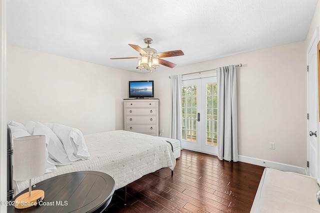 bedroom with ceiling fan, dark hardwood / wood-style floors, access to exterior, and french doors