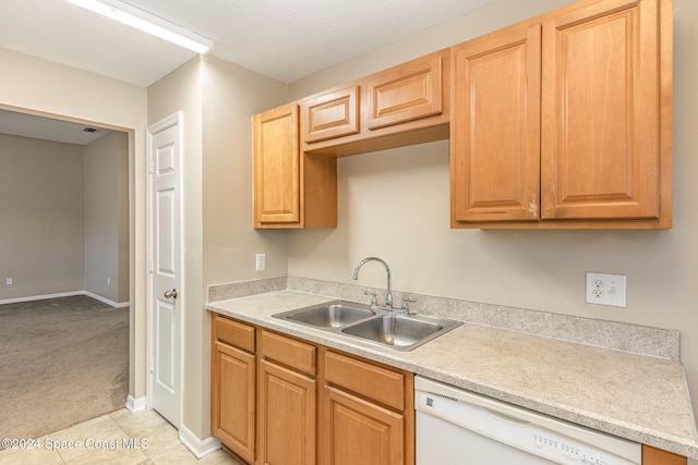 1796 Alaqua Way, Melbourne, FL 32904 - kitchen with dishwasher, light countertops, light colored carpet, and light tile patterned floors