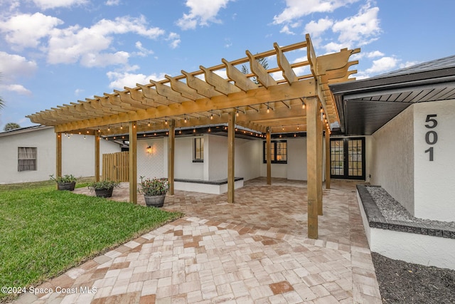 view of patio / terrace featuring a pergola and french doors