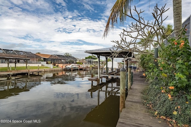 dock area with a water view