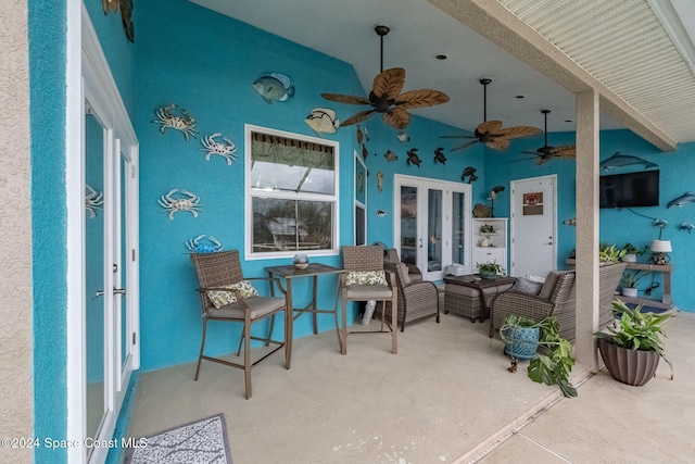 view of patio featuring french doors and ceiling fan