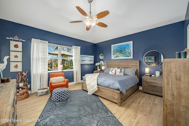 bedroom featuring ceiling fan and light hardwood / wood-style floors