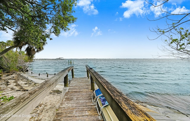 view of dock with a water view