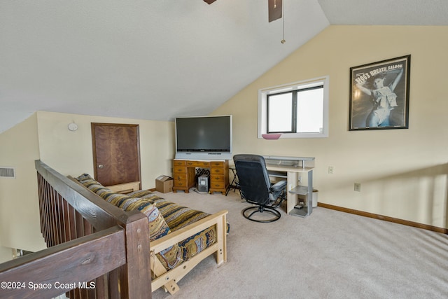 carpeted living room with vaulted ceiling and ceiling fan