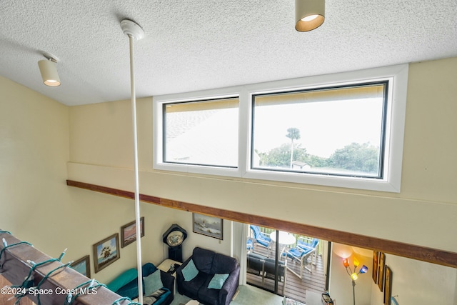 interior details featuring a textured ceiling