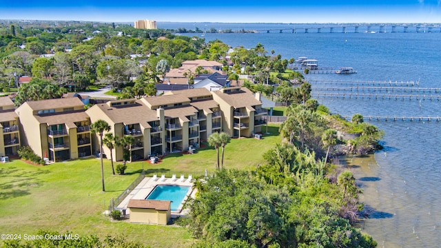 birds eye view of property featuring a water view