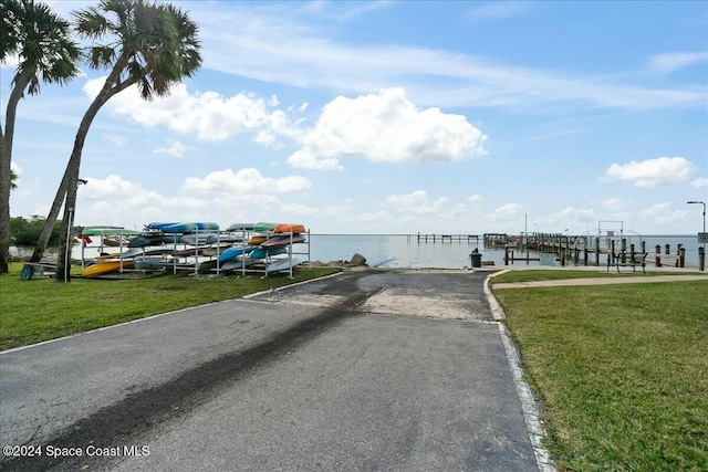 exterior space with a water view