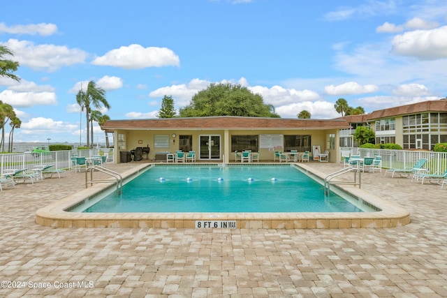 view of pool with a patio