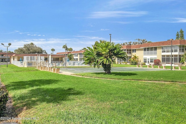 view of community with a lawn