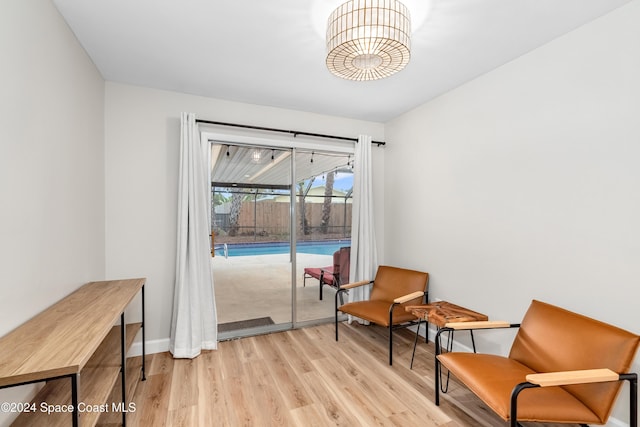 living area featuring light hardwood / wood-style floors