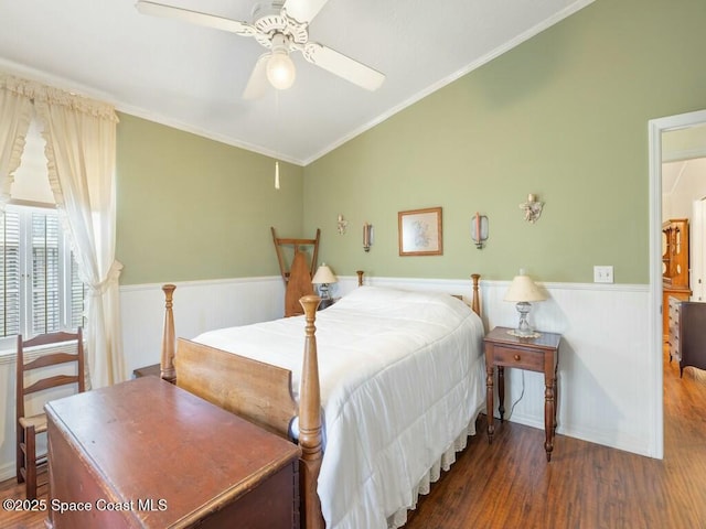 bedroom with ceiling fan, dark hardwood / wood-style flooring, and crown molding