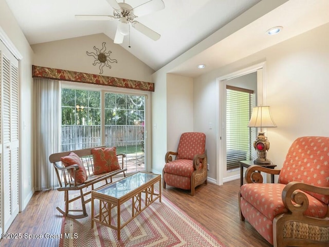 sitting room featuring ceiling fan, lofted ceiling, and hardwood / wood-style flooring