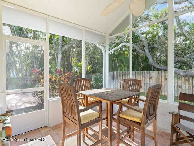 sunroom / solarium with vaulted ceiling